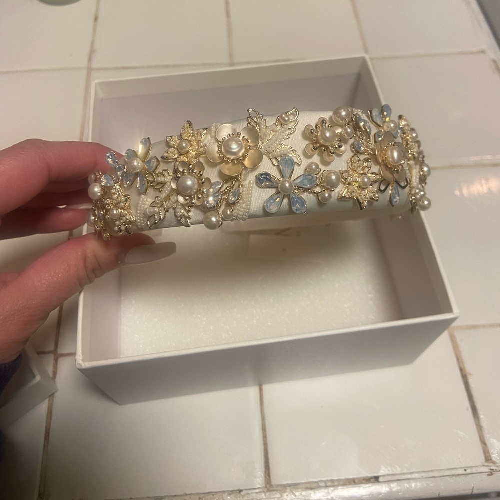 Bridal headband but can be used for other special occasions. Brand new.